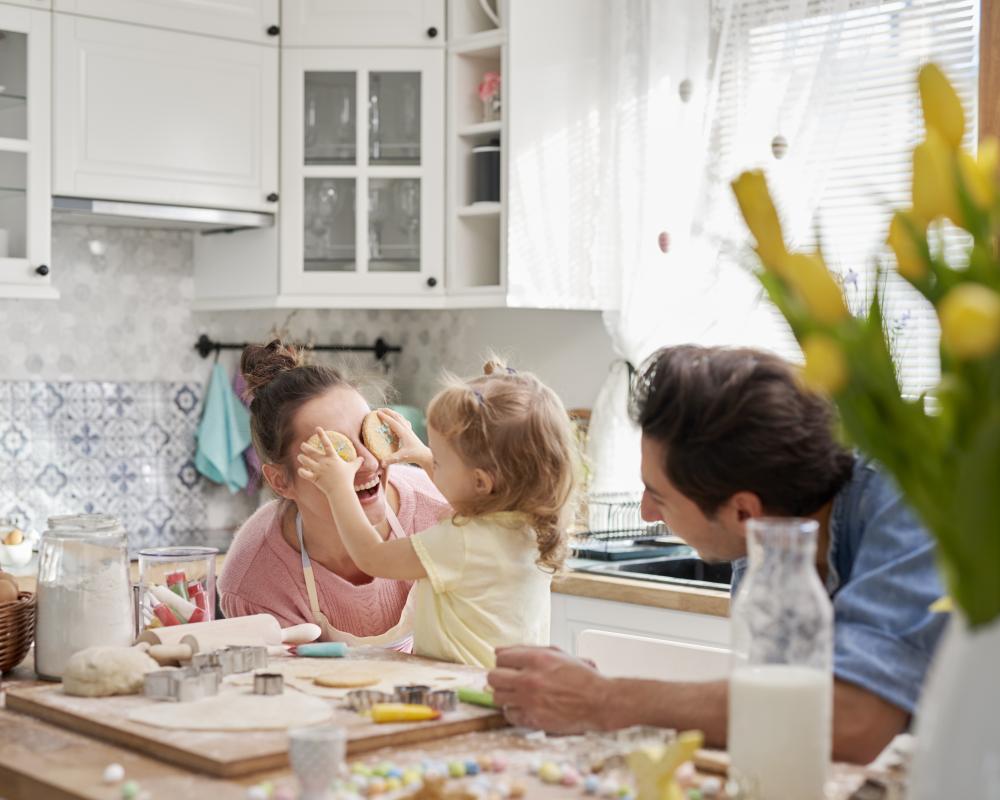 Family playing in kitchen